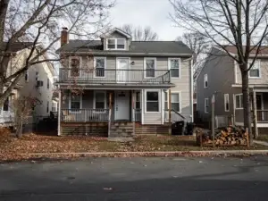 Autumn home exterior showing fall pest prevention entry points